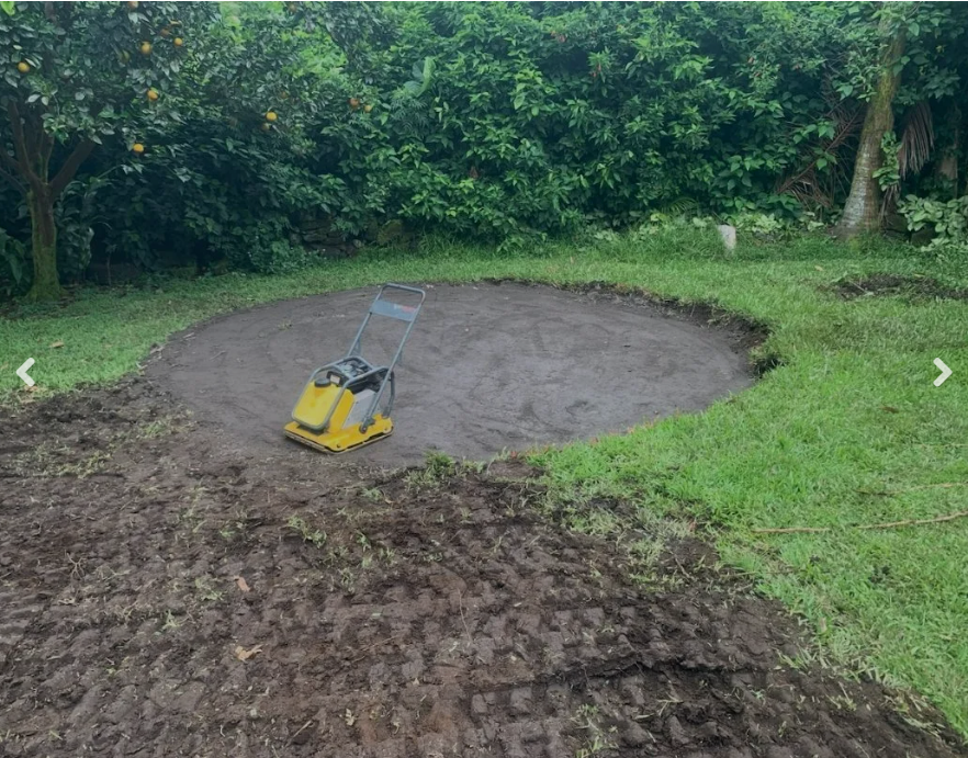 Compacted gravel pad preparation for water tank installation Hawaii